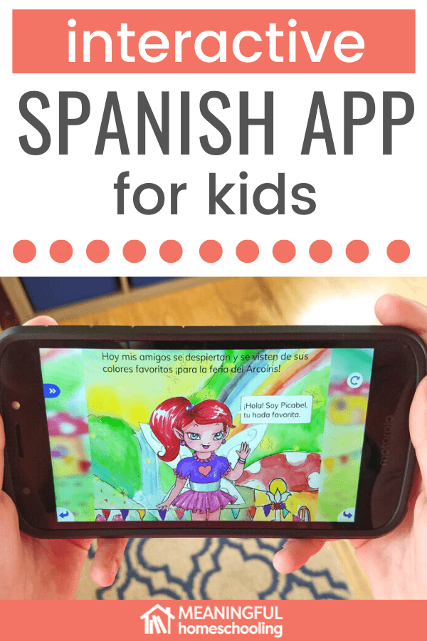 Girl's hands holding smartphone with Spanish app on screen