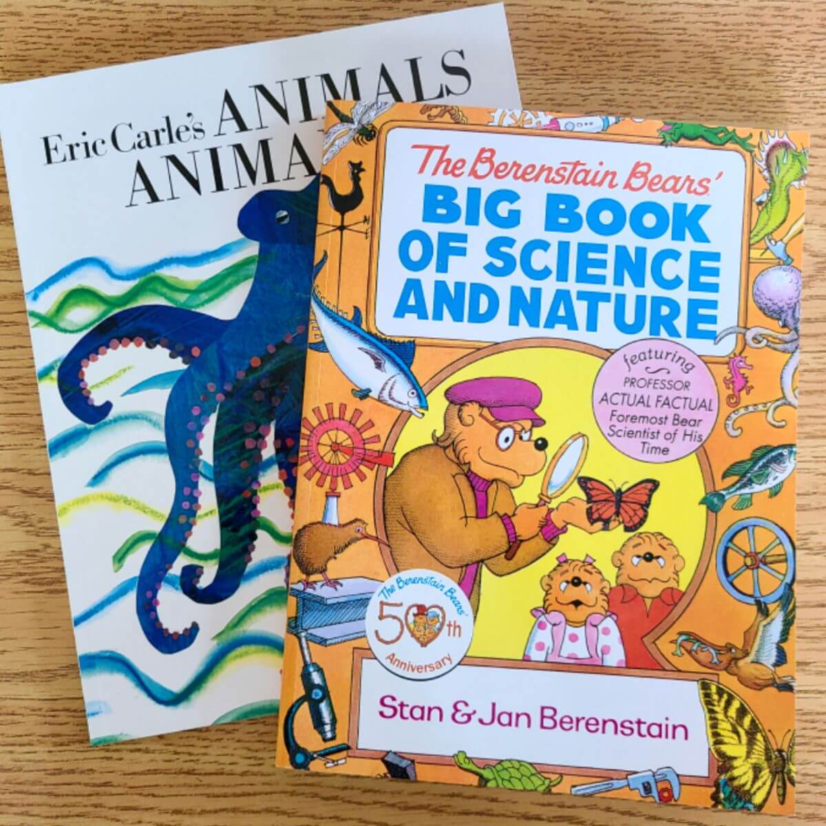 Image of 2 children's books entitled Eric Carle's Animals, and The Berenstain Bears' Big Book of Science and Nature