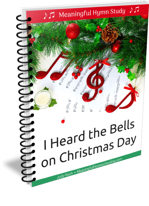 Spiral bound book with Christmas greenery and red music notes on cover with title "I Heard the Bells on Christmas Day."