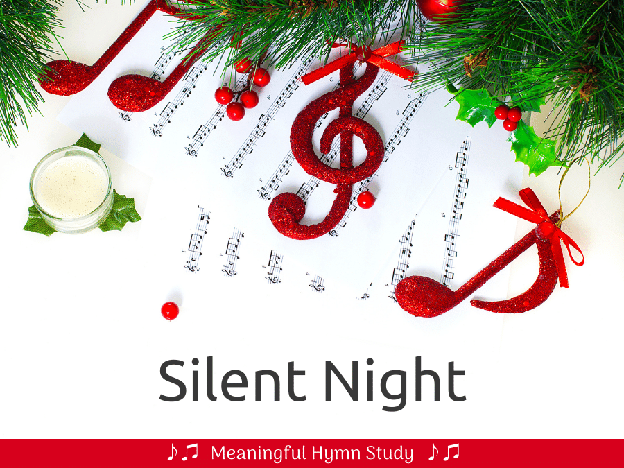 Image of greenery with pine cones and red Christmas balls lying beside several pages of sheet music; text overlay that says "Silent Night." 