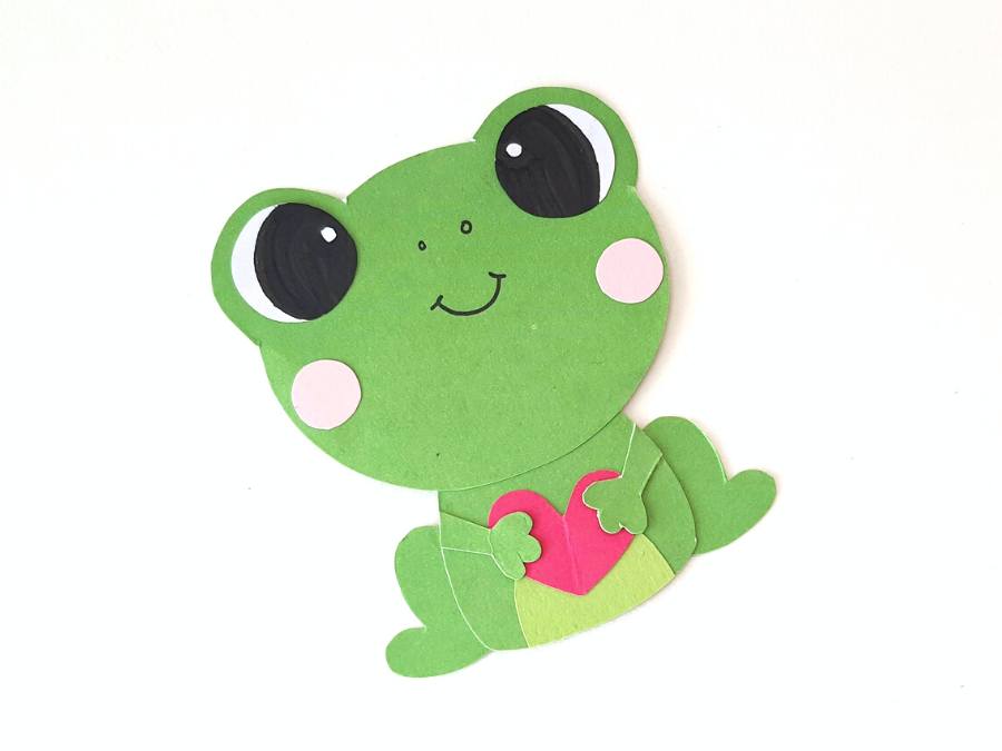 Image of completed frog paper craft on white background.